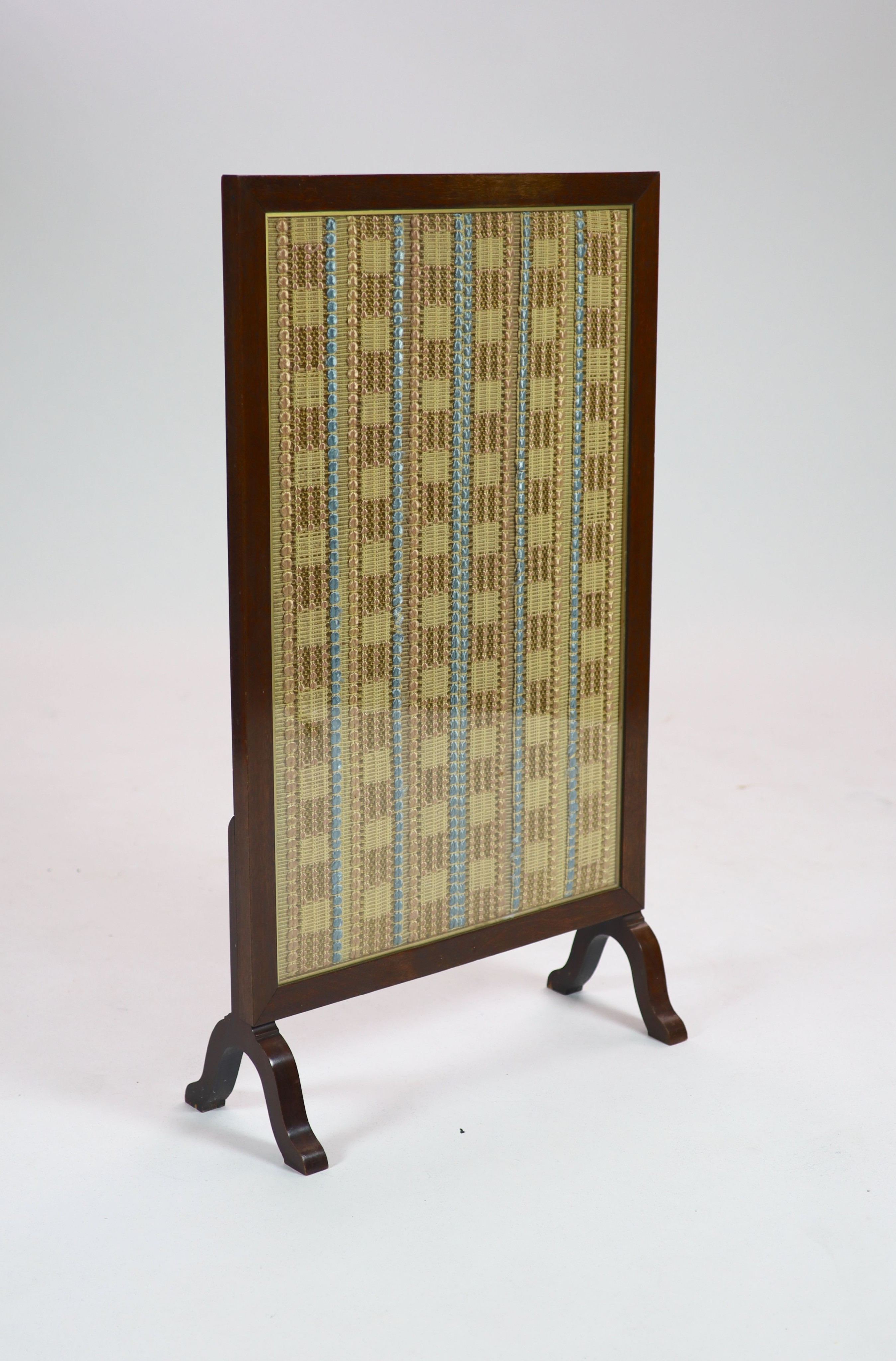 A mahogany cased and glazed embroidered fire screen of Royal interest 108 x 62cm.